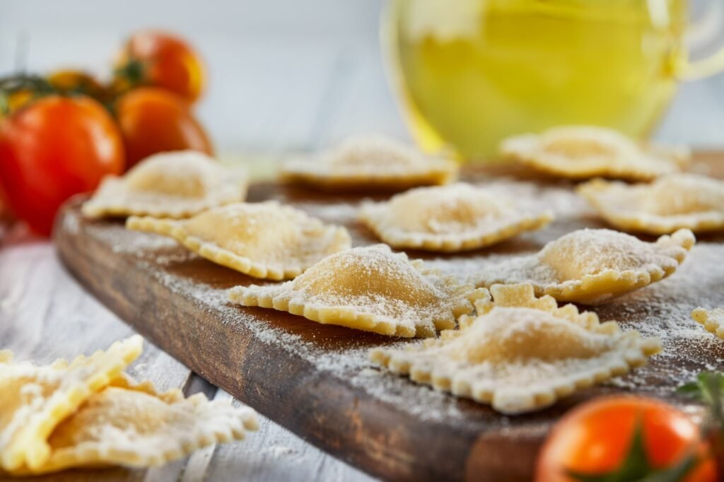 Tasty raw ravioli with flour